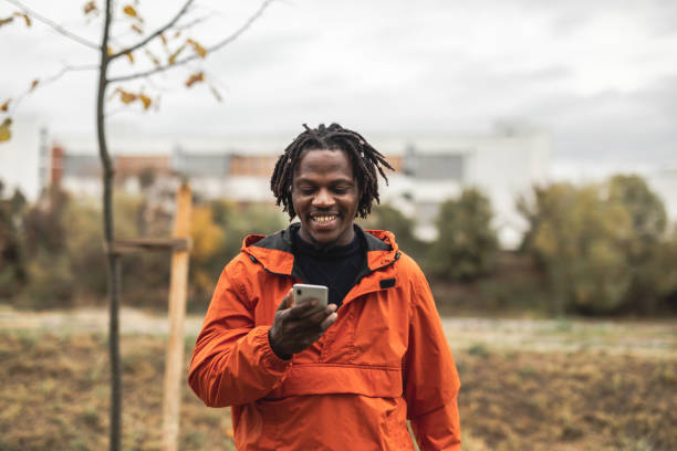 istock Smiling man have video call outdoor 1293590395