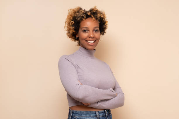 istock African american millennial woman looking at camera 1293590410