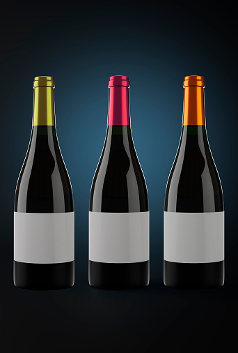 Variety of wine bottles on white background