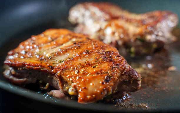 istock Duck fillet is cooked in a skillet. 1293600805