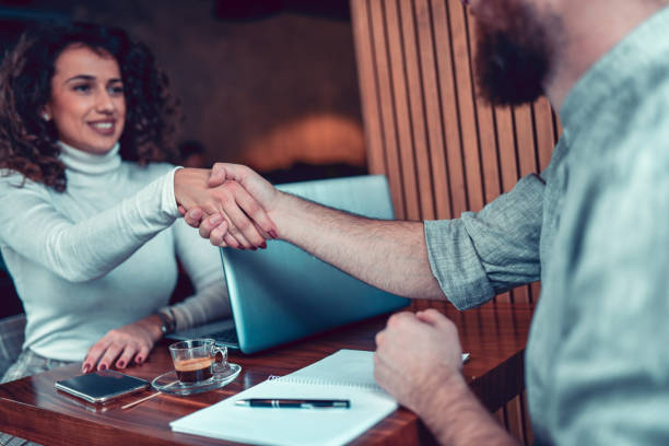 istock Business Coffee Meeting Between Female Insurance Agent And Her Client 1293600886