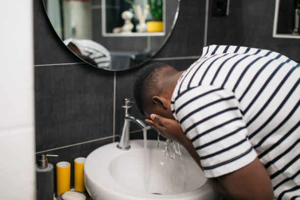 istock An unrecognizable African American man maintaining his personal hygiene 1293607949