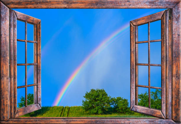 istock wooden old window sky view with rainbow 1293609399