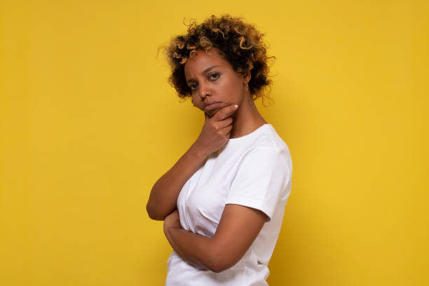 istock African american millennial woman looking at camera 1293609434