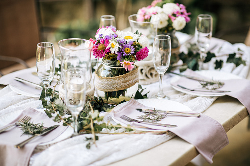 Wedding table decor setting. Flower Festive banquet dinner decoration