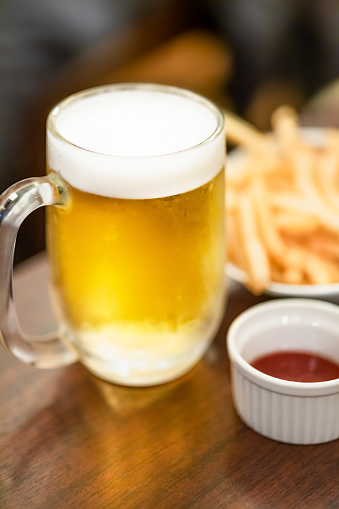 Beer and french fries at a drinking party