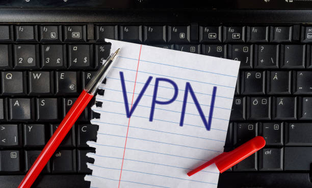 istock Paper width word VPN and pencil on laptop keyboard 1293616801