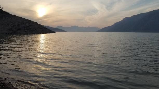 istock The view of sun sit and Dam water. 1293618858