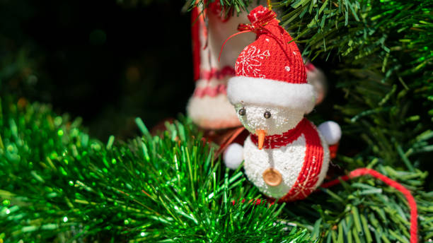 istock Snowman, Christmas tree ornaments on New Year's Day from close-ups. 1293620325