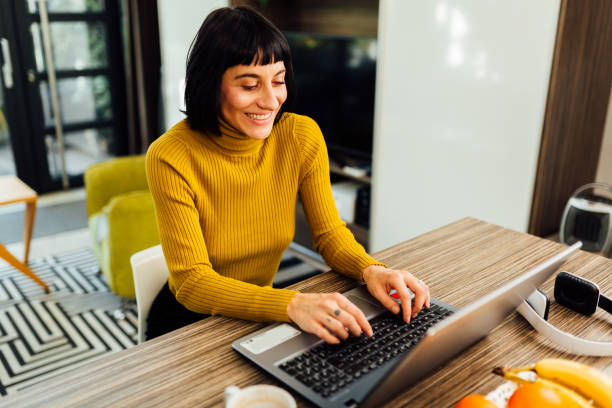 istock Happy Caucasian woman working from home 1293624465
