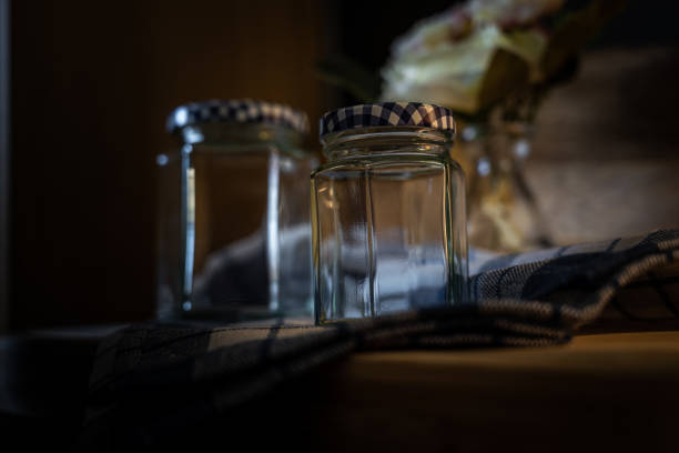 Three white vases on black background with copy space