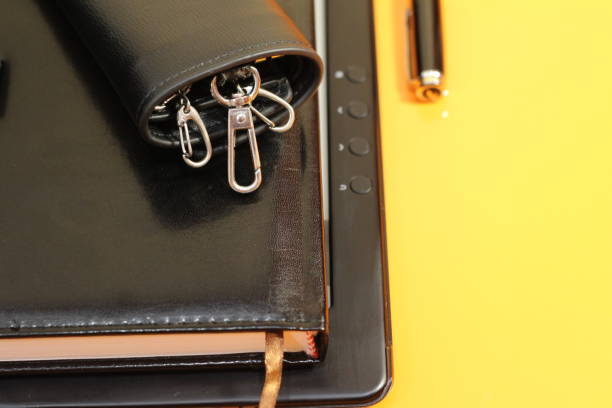 istock office Desk with book, pen, housekeeper 1293631237