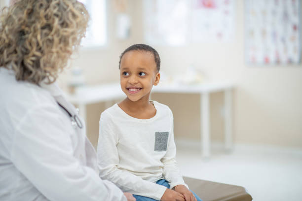 istock African American girl at doctor's office 1293634680