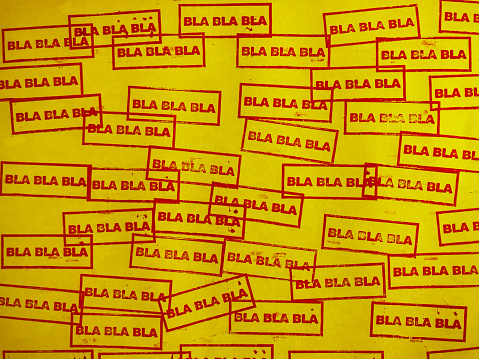 Bla bla bla rubber stamp on yellow.