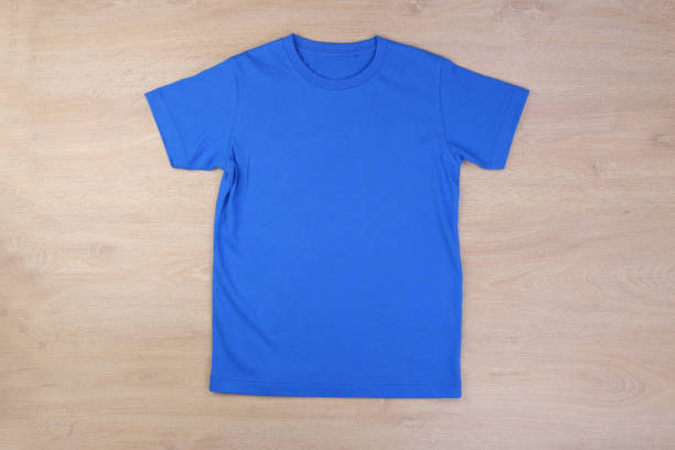 istock Front blue tshirt on wooden background 1293638141