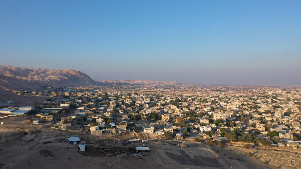 istock Aerial view over Jericho City in desert Sunset 1293641314