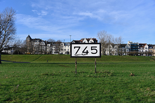 Duesseldorf, Germany, December 28, 2020 - The Kilometre sign, Rhine kilometre 745, at the level of the Oberkasseler Brücke / Tonhalle.