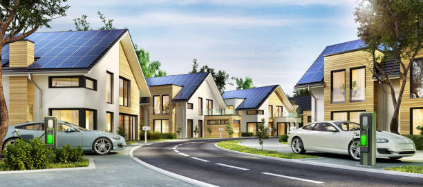 Modern houses with solar panels on the roof and electric car Street with modern houses. Modern homes with solar panels on the roof and electric vehicles. solar power station solar panel house solar energy stock pictures, royalty-free photos & images