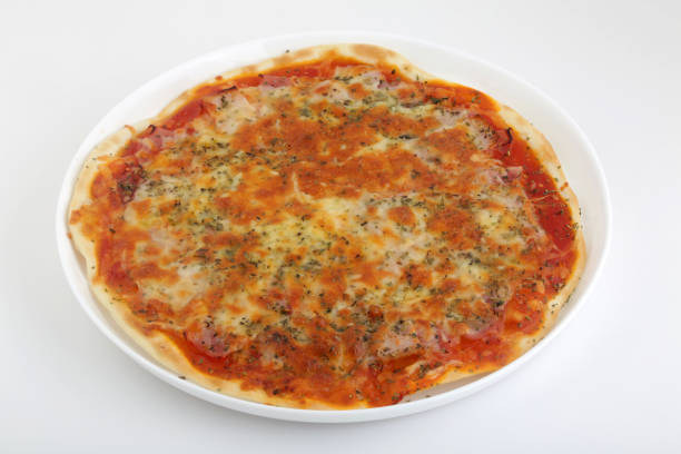 istock italian pizza with ham tomato and mozarella 1293643182