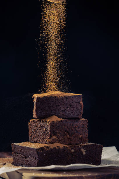 istock Sweet cake and flowing cinnamon powder 1293644255