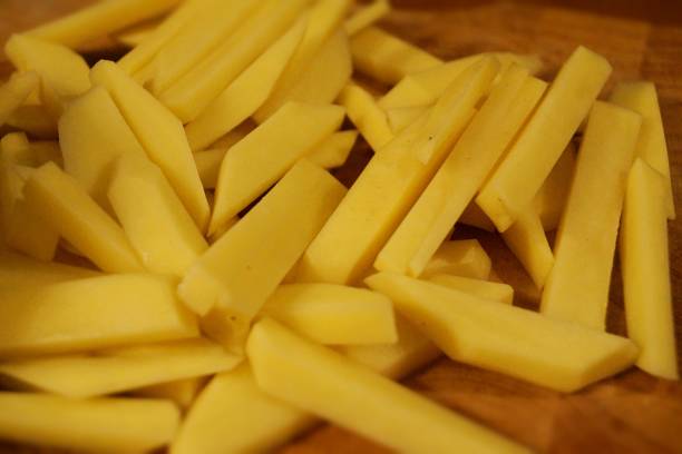 istock Preparing fresh french fries 1293646053