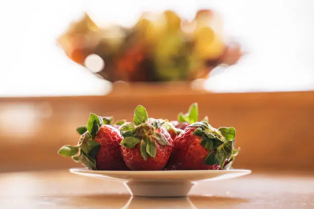 Photo of Strawberries on a table. Nature mort.