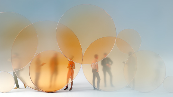 A group of business people standing behind yellow glass circles. All elements in the scene are 3D