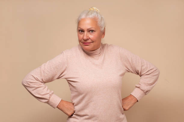 istock Smiling senior woman smiling looking at camera. 1293650479