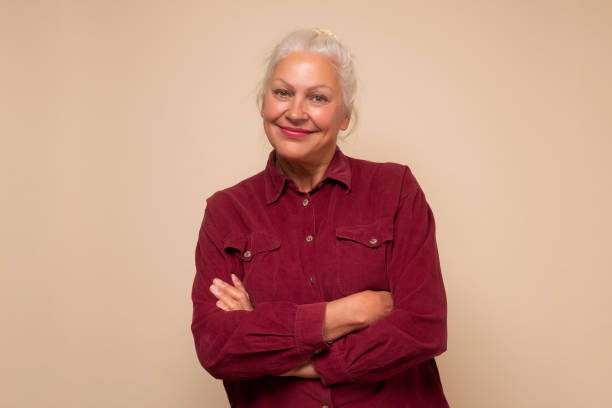istock Smiling senior woman smiling looking at camera. 1293650558