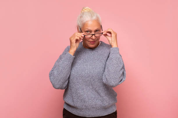 istock Smiling senior woman wearing eyesight smiling looking at camera. 1293650649