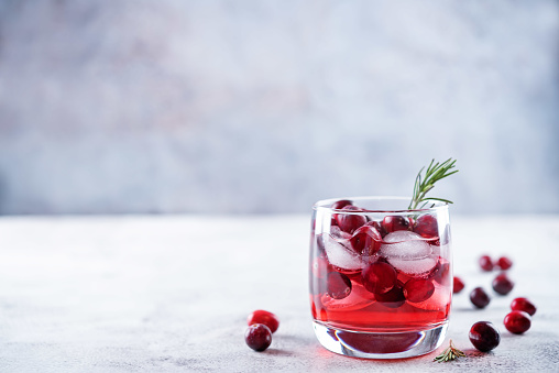 Red Christmas Mulled Wine Cocktail in snow scene