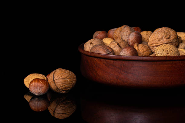 istock Mixed nuts in wooden bowl 1293652855