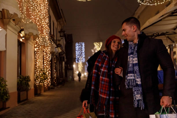 istock Walking home after going Christmas gift shopping 1293654909