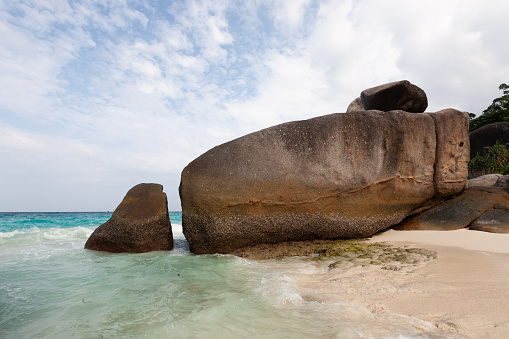 Cliffs and rocks on La Digue beach, Seychelles.