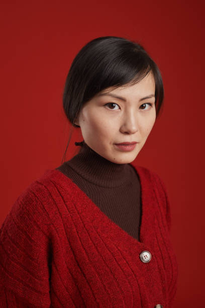 istock Attractive Asian Woman In Red 1293658471