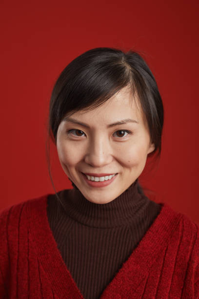 istock Chinese Woman Smiling Portrait 1293658475