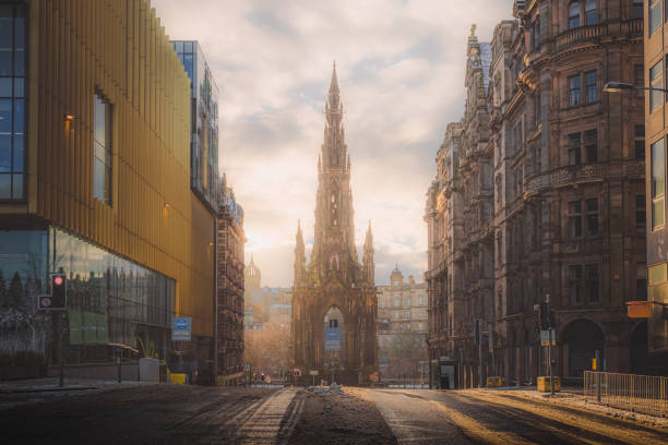Scott Monument in Edinburgh A view of the Sir Walter Scott Monument on Princes Street in Edinburgh on a winter's morning as golden light breaks through. edinburgh scotland photos stock pictures, royalty-free photos & images