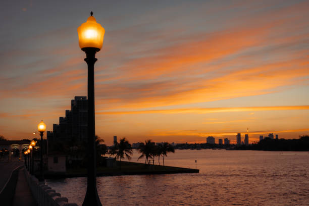 Light pole at sunrise on Venetian Causeway in Miami stock photo