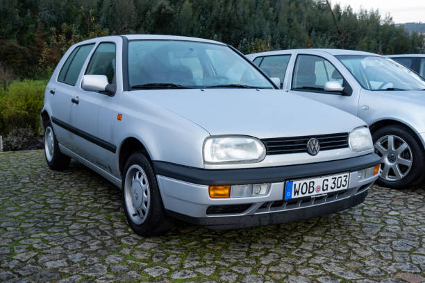 Raiva, Portugal - 11 December, 2019: Classic Volkswagen Golf III (1991-2003) on a parking. This model was the most popular Volkswagen vehicles in 90s.