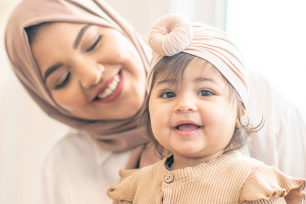 istock Beautiful Muslim mother and daughter 1293671247