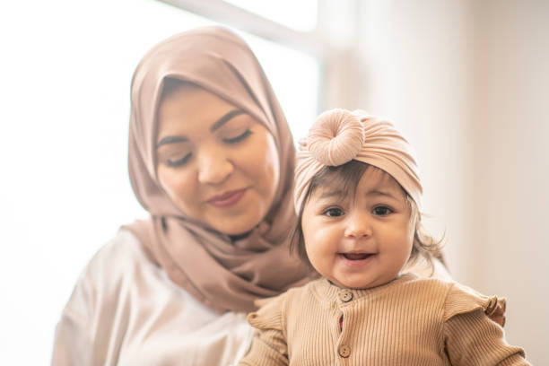istock Beautiful Muslim mother and daughter 1293671253