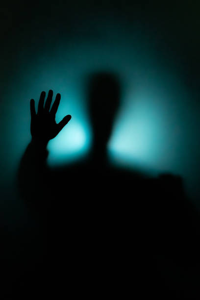 istock Athens, Greece - April 22, 2018: Silhouette behind the glass 1293671347