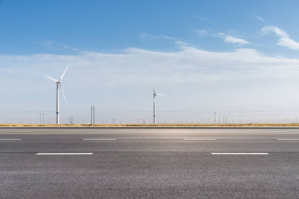 istock wind farm by the road 1293674109