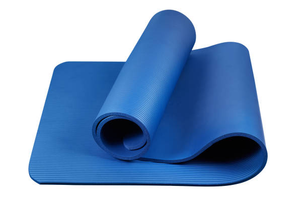 istock Blue yoga mat isolated on white background 1293679721