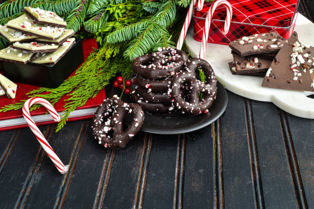 istock Bark Board with Peppermint Bark, Dark Chocolate Peppermint Bark and Peppermint Sprinkled Chocolate Pretzels 1293682789