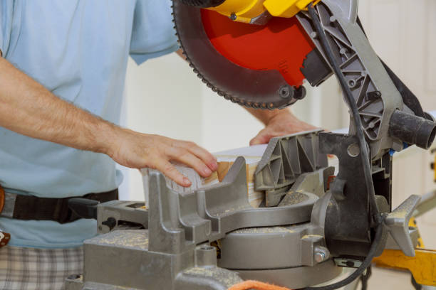 istock Close up of Circular saw cutting sharp rotary blade new baseboard woodwork 1293682814