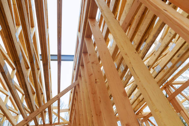istock New home construction framing of a house under construction 1293682819