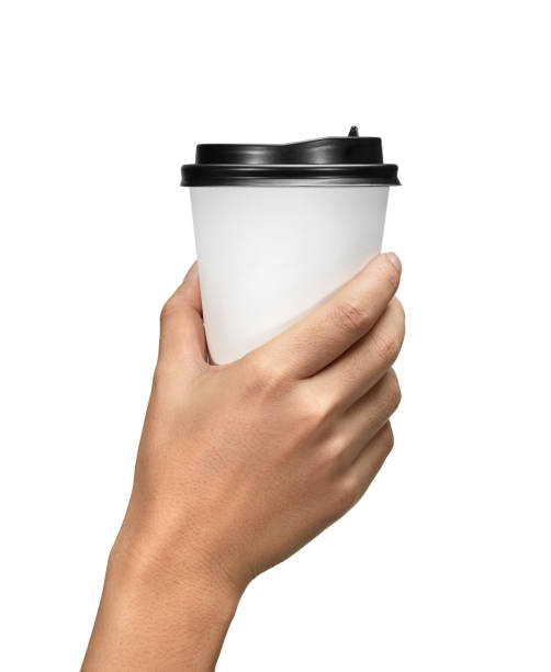 istock Male hand holding blank paper coffee cup isolated on white background 1293684463