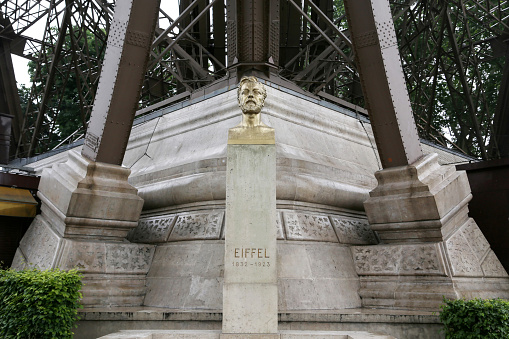 Paris, France - June 09, 2013: Bust of the architect Eiffel under the Eiffel Tower