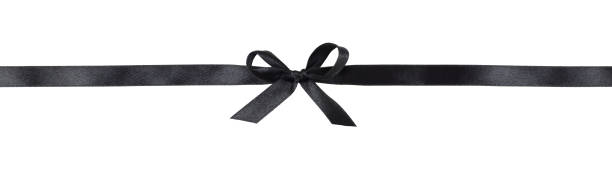 istock Black satin bow and ribbon 1293697908